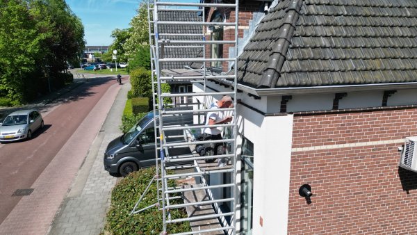 afbeelding van Buitenschilderwerk in Nieuw Amsterdam.